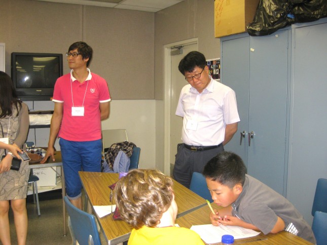Korean teachers observe enrichment camp participants.