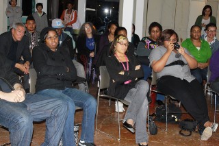 Audience watching Under-21 Open Mic performances