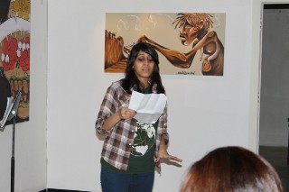 Young woman performing at Under-21 Open Mic