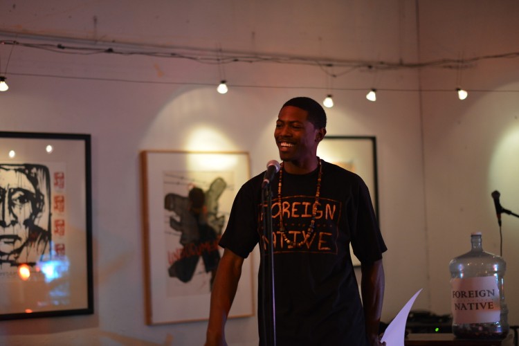 Poet-mentor, Andre "Dre-T" Tillman, performing at open mic