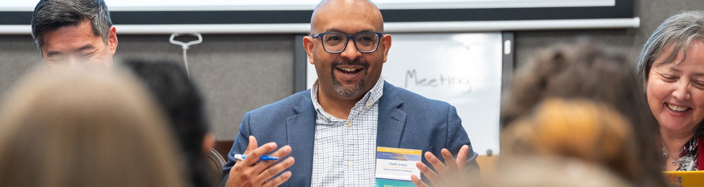 Garth Lewis presents as part of a Research Expo panel