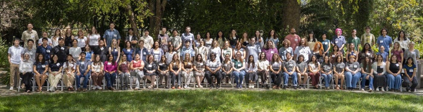 2026-27 TCMA cohort group photo showing approximately 100 students in rows