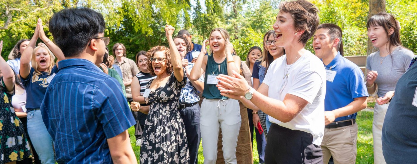 Crowd of students outdoors celebrating