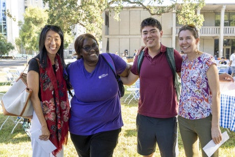 Dr. Nancy Tseng poses for a photo with three credential students.
