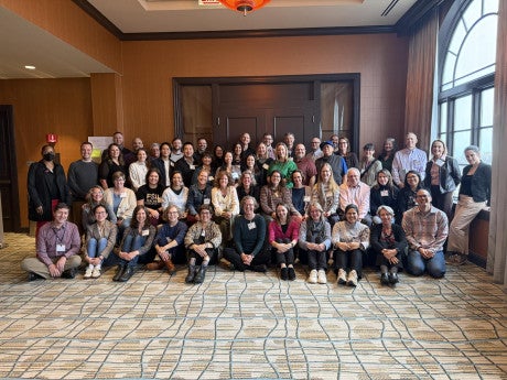 group photo of conference participants at the Orrington Hotel in Evanston