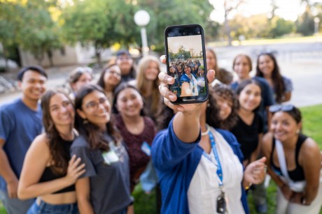 A large group of teacher education students take a selfie