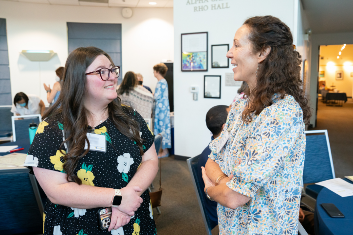 A student talks to lecturer Lisa Sullivan