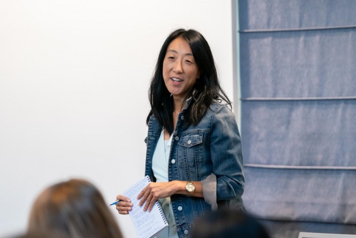 Nancy Tseng smiles at the group.