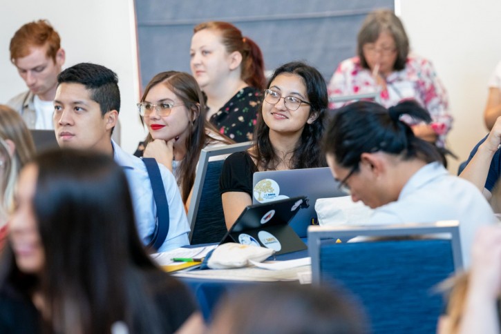 Students listen to the speaker.