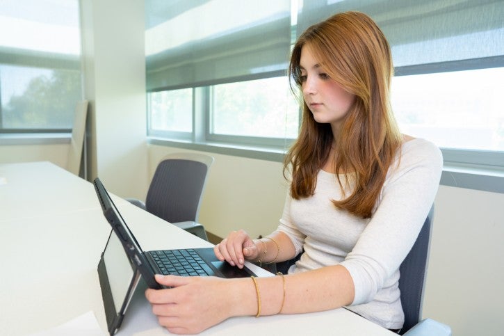 Student working on laptop