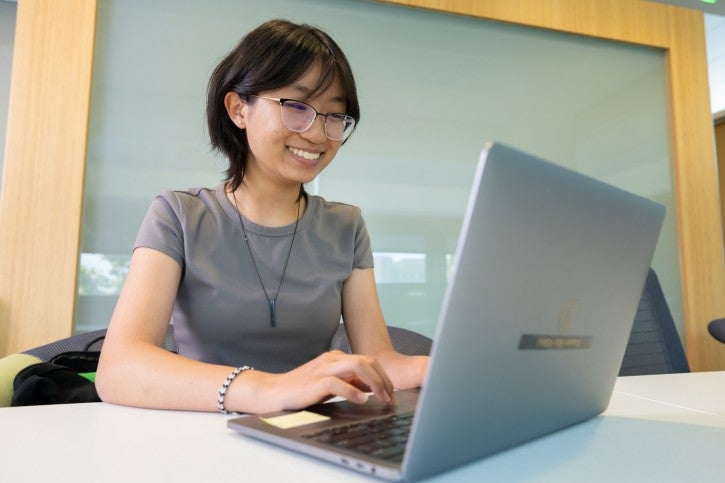 Student working on laptop