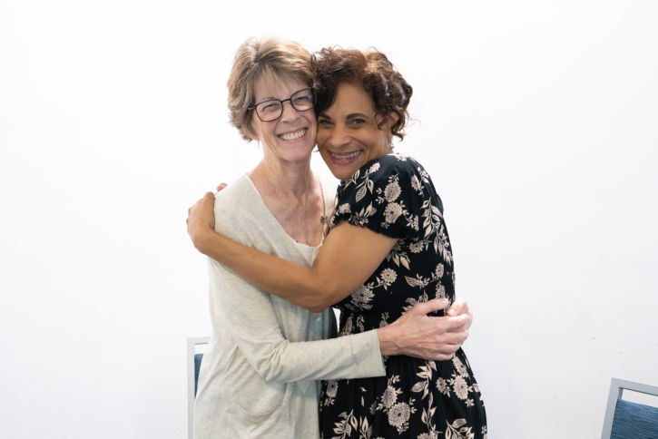 Kim Holsberry and Dr. Lola Muldrew hug