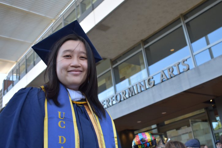MA grad Megan smiles in front of the Mondavi Center.