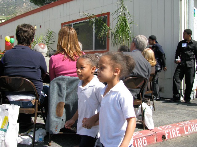 Two children holding hands