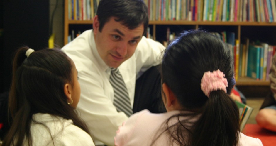 Thomas Prieto working with students in his classroom