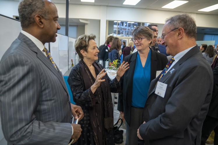 Gary May (left), Alice Waters (middle left), Lauren Lindstrom (middle right), and  Ralph Hexter (right) discussing the new Alice Waters Institute for Edible Education at UC Davis