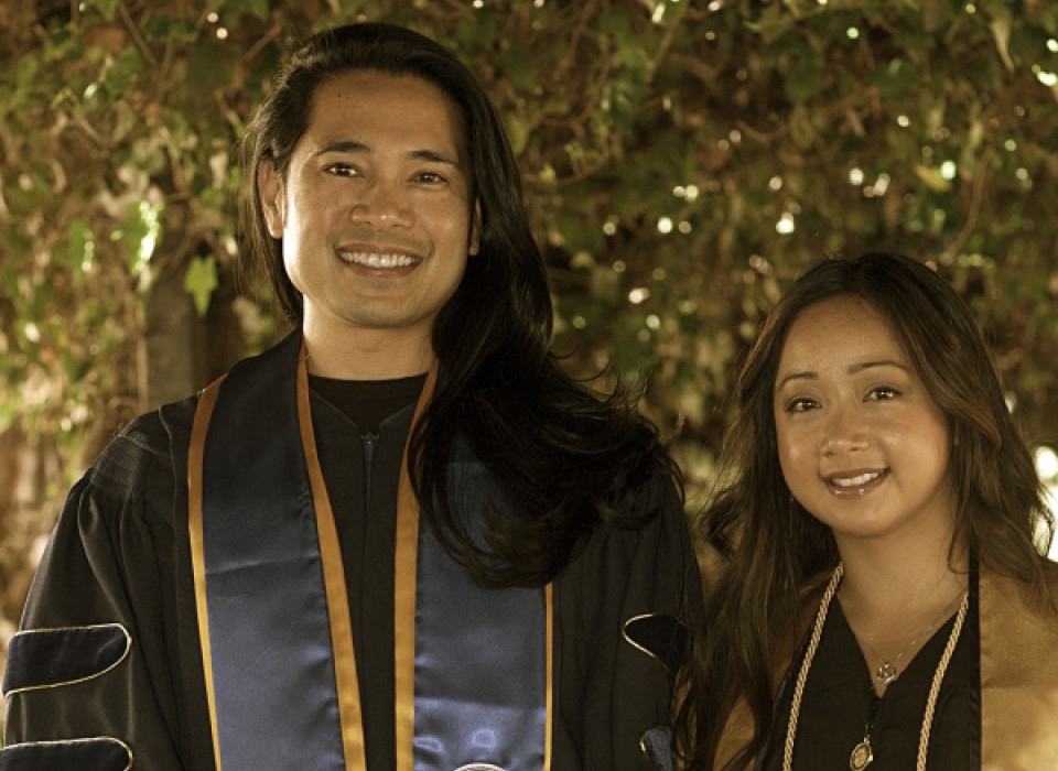 Portrait of Mikael Villalobos and his niece Isabel Nuñez in Graduation attire