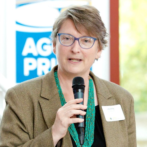 Portrait of Dean Lauren Lindstrom speaking 