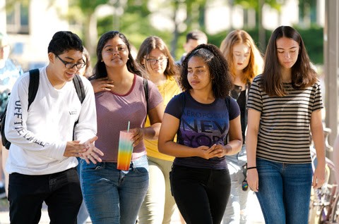 Group of students socializing outdoors